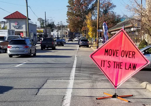 In the final phase of the study, again on the same day of the week and at the same time, the new "Move  Over  – It's the Law" sign was deployed. Note, the emergency lights were turned on, but the camera shutter speed  failed to capture them.